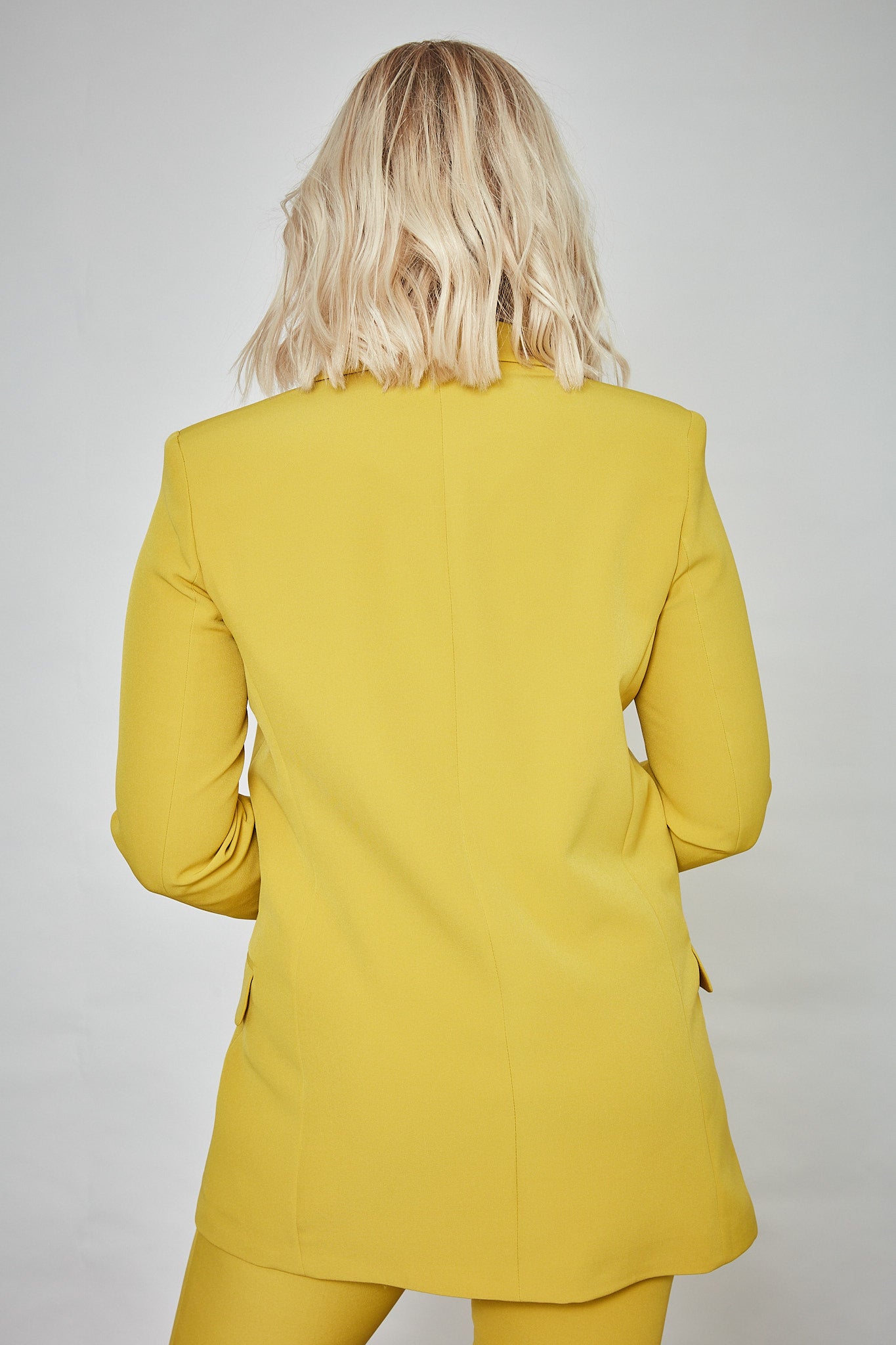 dames colbert geel, achterkant